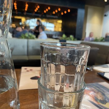 Earls Kitchen + Bar - lipstick stained water glass - Cocktail Bars Near Me - Denver, Colorado