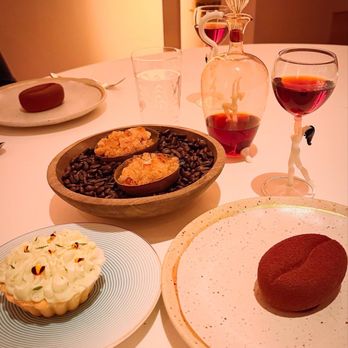 March - Genova Menu, Winter '24: Dessert course- the little tart in the bottom left corner was my favorite - Mediterranean Near Me - Houston, Texas
