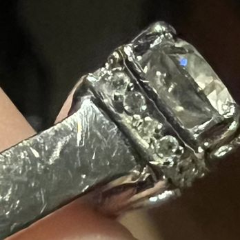 Victor's Fine Jewelry - Before. Deciding whether to reset or polish and clean. Noticeable scratches on 14kt white gold. - Jewelry Near Me - Honolulu, Hawaii Victor's Fine Jewelry - Before. Deciding whether to reset or polish and clean. Noticeable scratches on 14kt white gold. - Jewelry Near Me - Honolulu, Hawaii