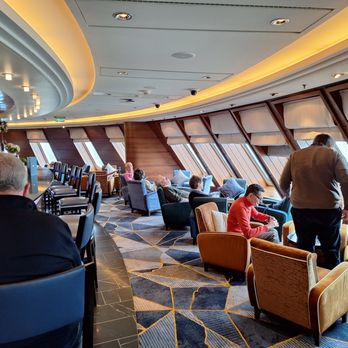 Cunard Line - This - the Commodore Lounge - is obviously in the front of the sloped superstructure and affords good views - Hotels Near Me - Southampton, HAM