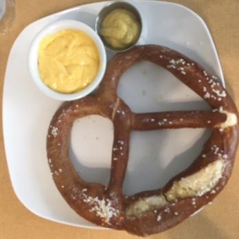 Colonial Cafe - Naperville - Jumbo Oktoberfest pretzel with cheese and mustard dipping sauces - Ice Cream & Frozen Yogurt Near Me - Naperville, Illinois