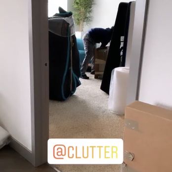 Clutter Moving & Storage - Orange County - My belongings being wrapped and boxed up by CLUTTER - Self Storage Near Me