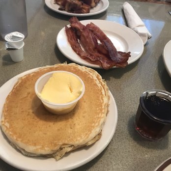 Mayberry Junction - Side of pancakes (served with my omelet) and an extra side of bacon - American Near Me - Manteno, Illinois
