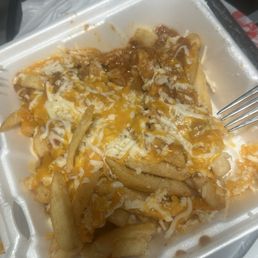 Look on the left side that's the amount of chill that was giving for a large chilli cheese fries.. never again smh.. Look on the left side that's the amount of chill that was giving for a large chilli cheese fries.. never again smh..