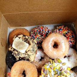 a variety of donuts in a box