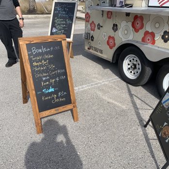 Sajima Street Fare - Specials written on chalk boards - Food Trucks Near Me