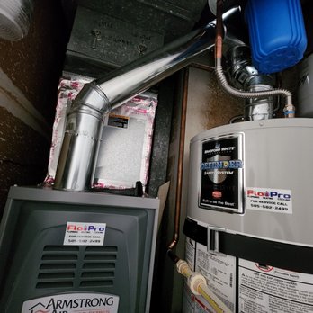 Flo Pro - A new 2 stage furnace and water heater with a sediment filter installed in Rio Rancho, NM - Plumbing Near Me