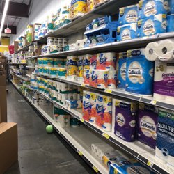 Dollar General - Empty selfs and merchandise in boxes