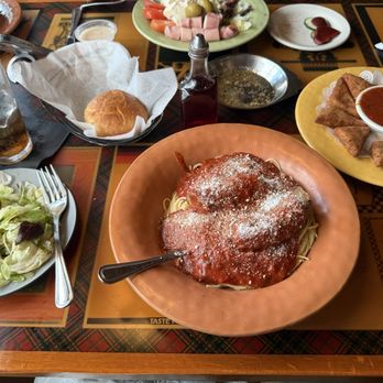 Johnny's Italian Restaurant - Cold salad, Pasta with Vermicelli Pomodori, and cheese triangles. - Italian Near Me - Clearwater, Florida Johnny's Italian Restaurant - Cold salad, Pasta with Vermicelli Pomodori, and cheese triangles. - Italian Near Me - Clearwater, Florida