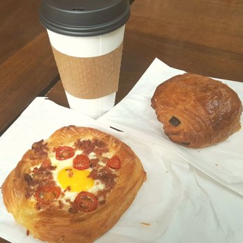 Petit Pierre Bakery - 16 oz mocha, Bacon & Egg savory, and Pain au Chocolat (9/6/21) - Bakeries Near Me - Seattle, Washington Petit Pierre Bakery - 16 oz mocha, Bacon & Egg savory, and Pain au Chocolat (9/6/21) - Bakeries Near Me - Seattle, Washington