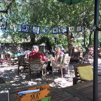 ChocolaTree - Outdoor garden seating. Love the wind chimes. - Vegetarian Near Me - Sedona, Arizona ChocolaTree - Outdoor garden seating. Love the wind chimes. - Vegetarian Near Me - Sedona, Arizona