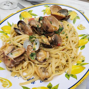 Locanda Amalfi - My wife's Fettuccine Vongole - clams were good but pasta wasn't al dente and the sauce wasn't up to par - lacked flavor, mostly olive oil. - Italian Near Me - Pleasanton, California