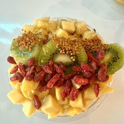 Playa Bowls - Mango bowl with goji berries kiwi mango bee pollen and pineapple