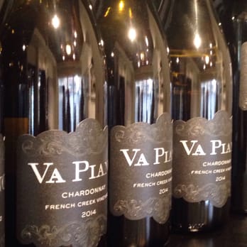 Va Piano Vineyards - Spokane - a row of wine bottles - Wine Tasting Room Near Me - Spokane, Washington Va Piano Vineyards - Spokane - a row of wine bottles - Wine Tasting Room Near Me - Spokane, Washington