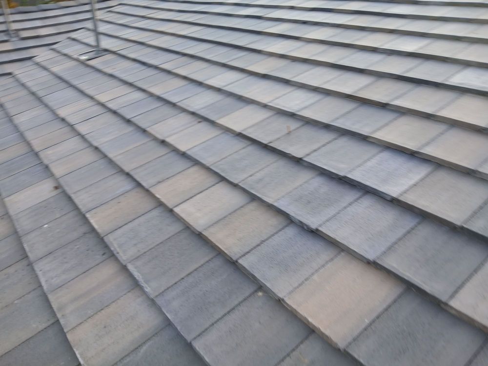 Slide of Prestige Roofing