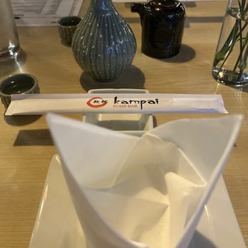 Kampai Sushi Bar - Beautiful napkin and hot sake for two - Japanese Near Me - St Louis, Missouri