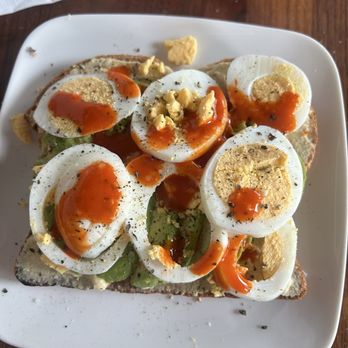 Coffee & More - Avocado Hummus and Egg Toast - with plenty of chalula - Coffee & Tea Near Me - Sunnyvale, California Coffee & More - Avocado Hummus and Egg Toast - with plenty of chalula - Coffee & Tea Near Me - Sunnyvale, California