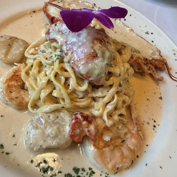 La Grotta Ristorante - Special of the night saffron pasta, lobster, shrimp and scallops with a saffron cream sauce! AMAZING - Italian Near Me - Richmond, Virginia La Grotta Ristorante - Special of the night saffron pasta, lobster, shrimp and scallops with a saffron cream sauce! AMAZING - Italian Near Me - Richmond, Virginia