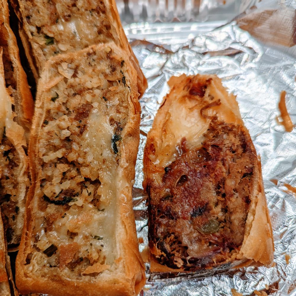 Robin’s Snowflake Donuts & Cafe - Boudin Eggroll + Smoked Brisket Eggroll - Donuts Near Me - Spring, Texas