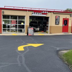 Victory Lane Quick Oil Change - Our entrance, just drive around to the back and we will guide you in.