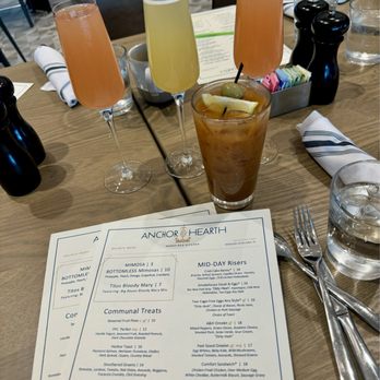 Anchor & Hearth Woodfired Kitchen - 4 flavors of mimosas yummy Bloody Mary - New American Near Me - Baytown, Texas