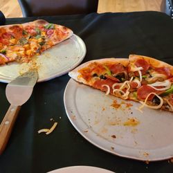 Buffalo pizza on left, veggie and meat on right!