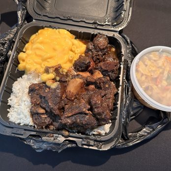 Jerky's Jamaican Grill - Oxtails white rice Mac & Cheese, cabbage - Caribbean Near Me - Columbus, Ohio