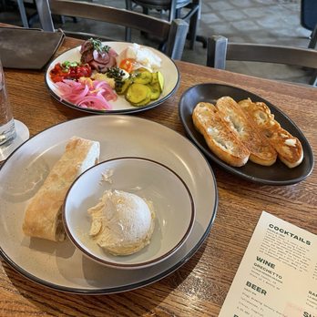Forgotten Tonic - Bread with cinnamon butter, pickle plate with toasted bread - both delicious! - Wine Bars Near Me - Saint Augustine, Florida Forgotten Tonic - Bread with cinnamon butter, pickle plate with toasted bread - both delicious! - Wine Bars Near Me - Saint Augustine, Florida