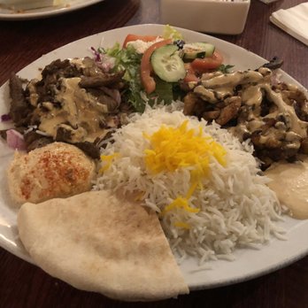 Pom & Olive - Shawarma Trio (chicken and beef mixed on the right side, lamb on the left) - Mediterranean Near Me - Costa Mesa, California Pom & Olive - Shawarma Trio (chicken and beef mixed on the right side, lamb on the left) - Mediterranean Near Me - Costa Mesa, California