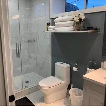 Easy Renovation - a bathroom with a toilet and shower - General Contractors Near Me - North York, Ontario Easy Renovation - a bathroom with a toilet and shower - General Contractors Near Me - North York, Ontario