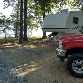 Oak Hollow Campground - The parking area of C6. As you can see, gravel without concrete/asphalt. There was enough room to keep our truck connected to the camper. - Fishing Near Me - High Point, North Carolina Oak Hollow Campground - The parking area of C6. As you can see, gravel without concrete/asphalt. There was enough room to keep our truck connected to the camper. - Fishing Near Me - High Point, North Carolina