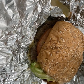 Five Guys - a hamburger wrapped in aluminum foil - Burgers Near Me - Surrey, British Columbia