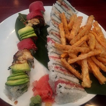 Sushi Katana - On the right, the spicy tuna sandwich roll with sweet potato fries. - Sushi Bars Near Me - Orlando, Florida