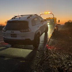 Mobile Maintenance & Towing - My vehicle being towed from the side of the road
