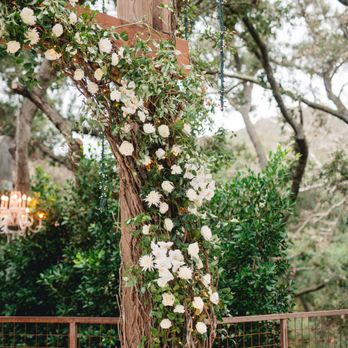 Shindig Chic - Obsessed with the florals added to the archway of our ceremony. - Florists Near Me