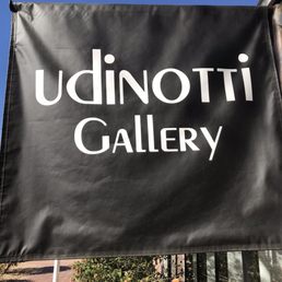 Exterior outside entrance of Udinotti Gallery - Sign - Scottsdale, Arizona Exterior outside entrance of Udinotti Gallery - Sign - Scottsdale, Arizona