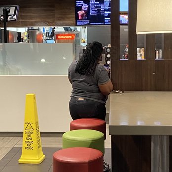McDonald's - This is the employee that told me they were closed. As you can see she is on her phone. - Fast Food Near Me - Jupiter, Florida