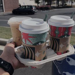 two cups of coffee on a tray