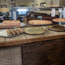 Pizza Man's Pizza - Daily counter pizzas and Italian specialties