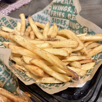 Wingstop - Large seasoned fries. - Chicken Wings Near Me - Porterville, California Wingstop - Large seasoned fries. - Chicken Wings Near Me - Porterville, California