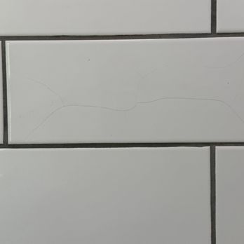 Michigan Building Specialties - Cracked tile in master bathroom shower - General Contractors Near Me - Adrian, Michigan