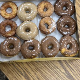 A dozen low quality expensive donuts.