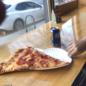 Benny DiCarta's - huge slice! - Pizza Near Me - Kalamazoo, Michigan Benny DiCarta's - huge slice! - Pizza Near Me - Kalamazoo, Michigan