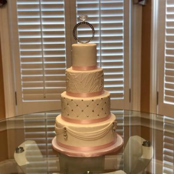 Creative Queen - a wedding cake on a glass table - Custom Cakes Near Me Creative Queen - a wedding cake on a glass table - Custom Cakes Near Me