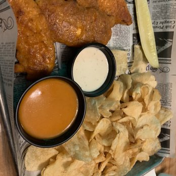 Pour Taproom - Wilmington - Chicken tenders in mild sauce with chips - Beer Bar Near Me - Wilmington, North Carolina Pour Taproom - Wilmington - Chicken tenders in mild sauce with chips - Beer Bar Near Me - Wilmington, North Carolina