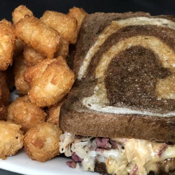 McColley's - Corned Beef Reuben (shown with tots) - Irish Near Me - Spencerport, New York McColley's - Corned Beef Reuben (shown with tots) - Irish Near Me - Spencerport, New York