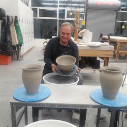 The Local Artisan Collective - One of our talented artist making pottery for the store in his studio at Weber State University.