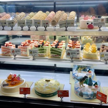 Tous Les Jours - That pig cake in the back - Bakeries Near Me - Cary, North Carolina