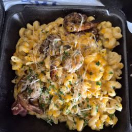 Stuffed Turkey Leg with Mac and Cheese and a surprise ingredient Shrimp.
