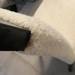 The Upholstery Place - Where the upholstered fabric is separating from chair.